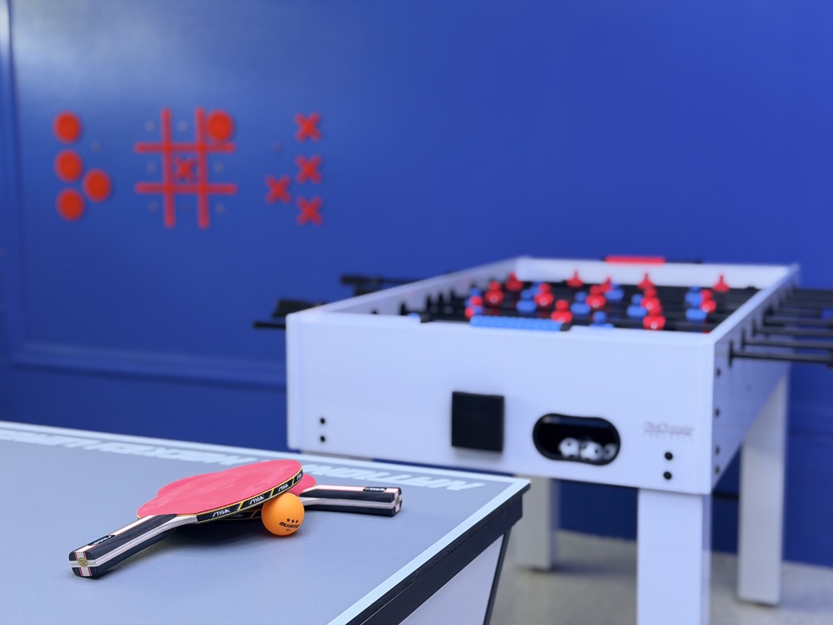 Castle Keys game room ping-pong table with paddles