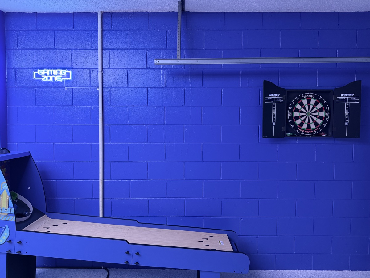 Castle Keys game room Skee-Ball lane and dart board